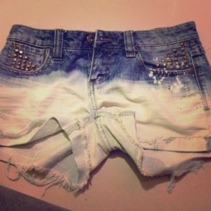 Shorts with studs stressed and bleached