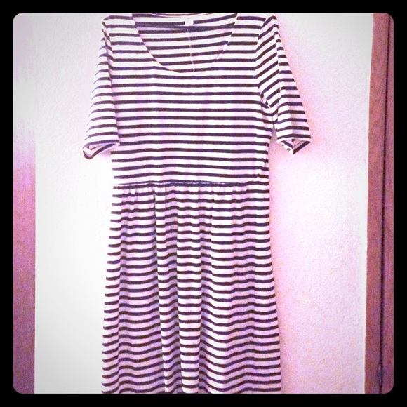 White dress Black stripes.