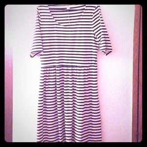 White dress Black stripes.