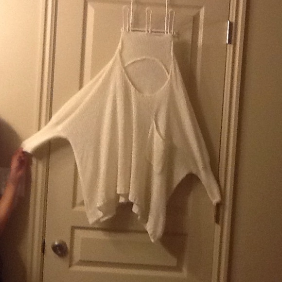 While knitted lightly loose sweater
