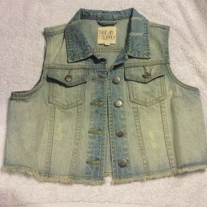 Light wash vest.