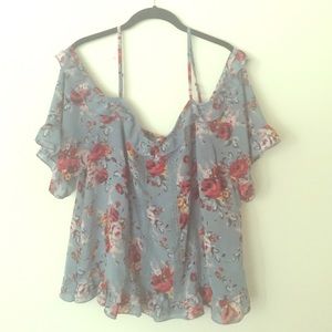 Blue open shoulder top with floral pattern