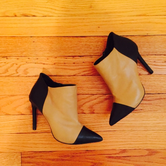 Tan and black booties