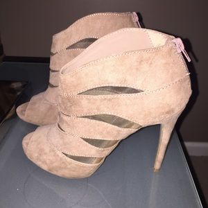 Zip back, tan heal booties, Nine West, worn once