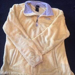 Yellow and gray north face jacket