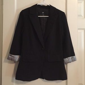 Single button black blazer.
