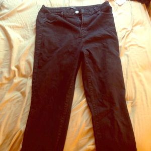 High-waisted black skinny jeans