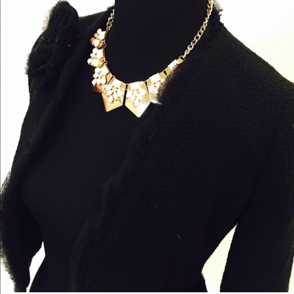 Black cropped jacket with lace detailing on collar