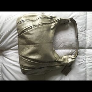 Authentic Tignanello silver side bag.