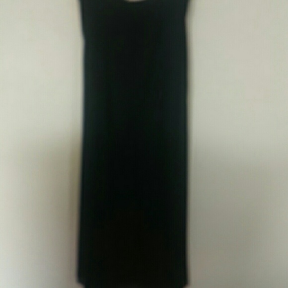 Stunning black skirt with slit overlays.