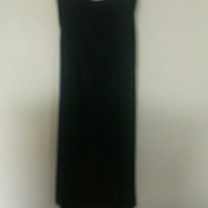 Stunning black skirt with slit overlays.