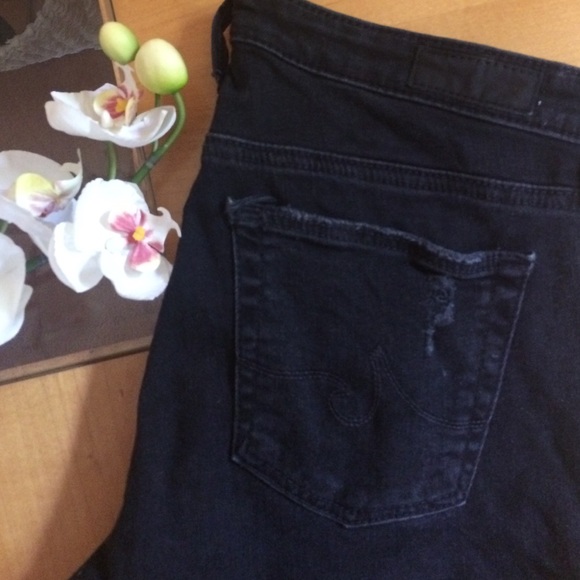 Distressed black AG denim