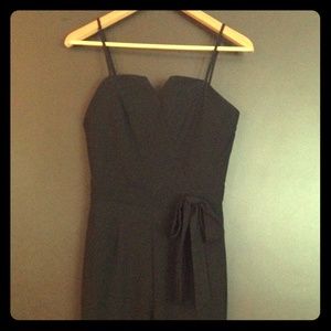 Black wide-leg jumpsuit with bow