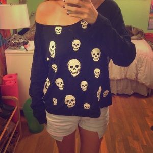Off shoulder cut out skull sweater