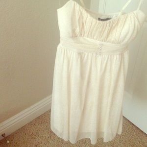 Formal White dress with gold sparkles.