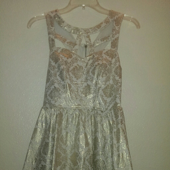 Do & Be white dress with gold accents all over
