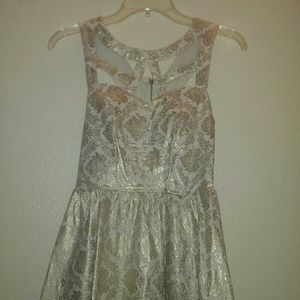 Do & Be white dress with gold accents all over