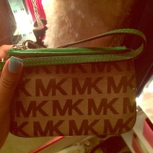 micheal kors wristlet with green trim