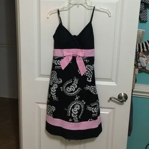 Black, pink, and white empire waist dress