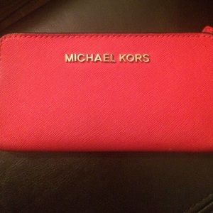 A Michael kors phone wallet!