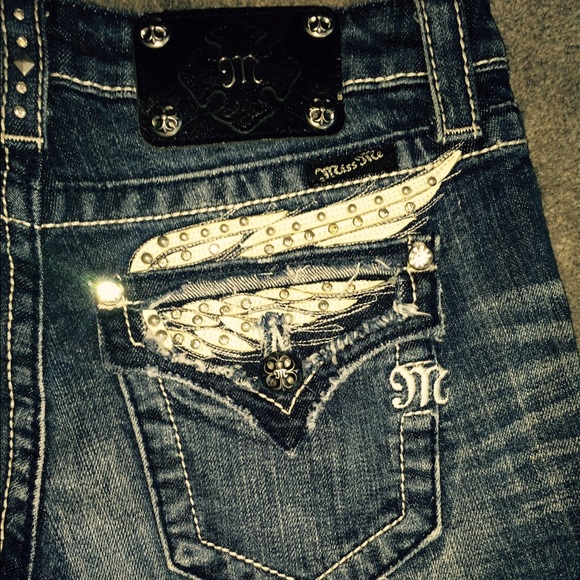 Distressed Miss Me short with awesome wing detail!