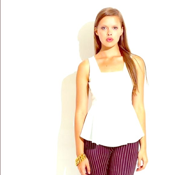 White peplum sleeveless top