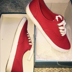 Red lace up skateboard shoes