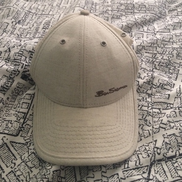 Light beige hat with leather strap