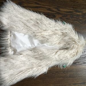 White faux fur vest