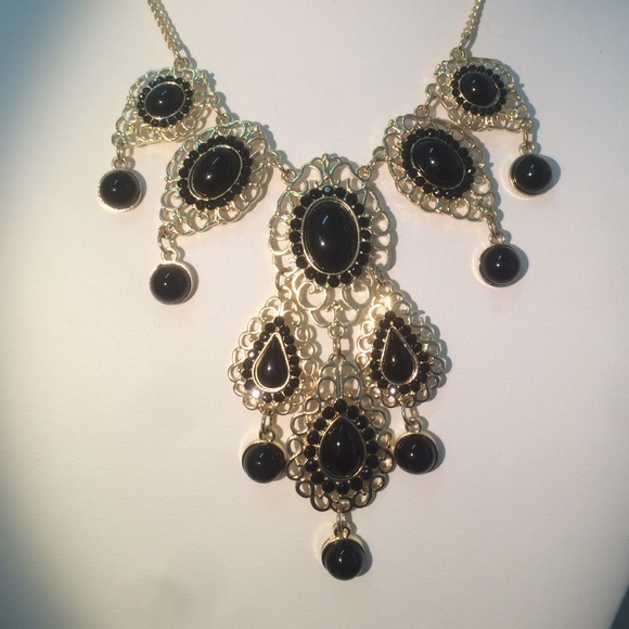 Gold and black neck and earring statement set