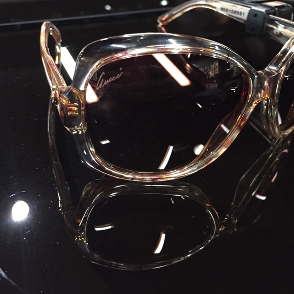 Plastic round framed glasses.