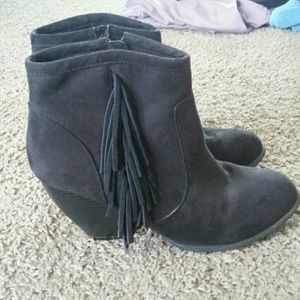 Black booties with fringe
