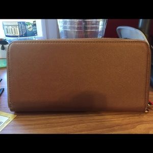 Brown Wallet w/ a built in external phone charger
