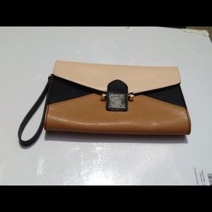 The Limited Tan and Black Clutch