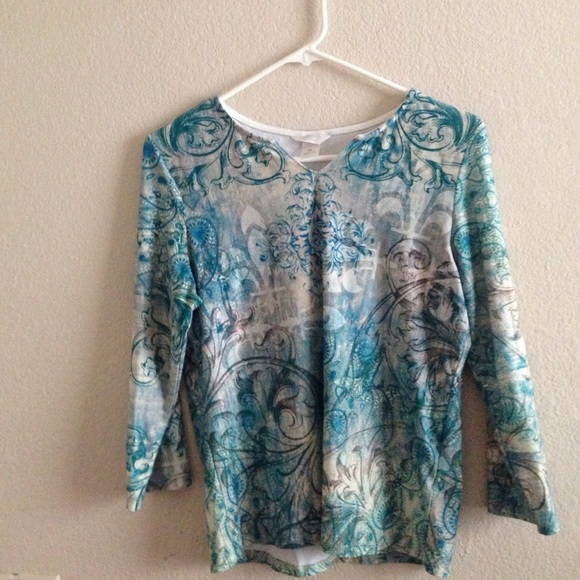 Decorative ocean blue long sleeved shirt.