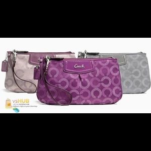 Purple coach wristlet with tags!