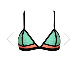 Authentic triangl top.