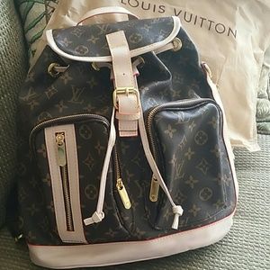 Brand new with Dust bag!!! Inspired LV backpack!