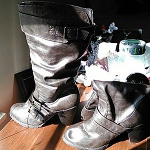 Size 7 calf length three inch heeled boots