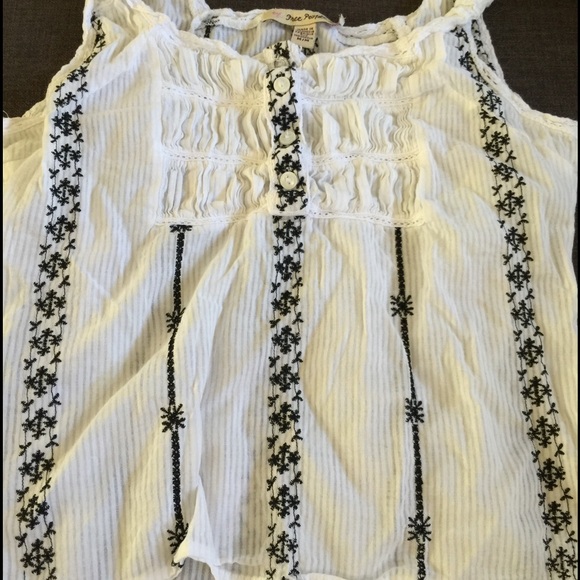 Free people top size medium. Can fit small