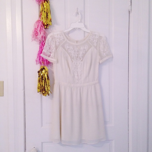 White lace cutout dress