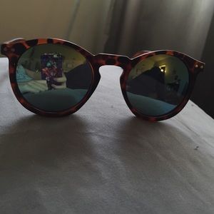 Blue reflective brown rim glasses