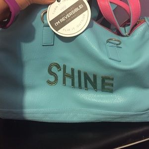 Cute reversible sparkly carry on