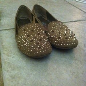 taupe color flats with spikes