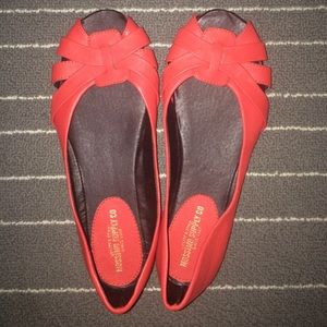 Coral peep-toe flats