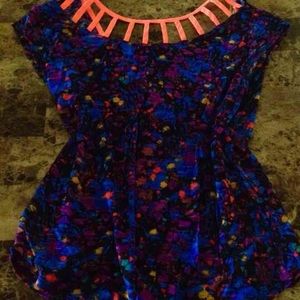 Beautiful patterned and coral cage detailed top