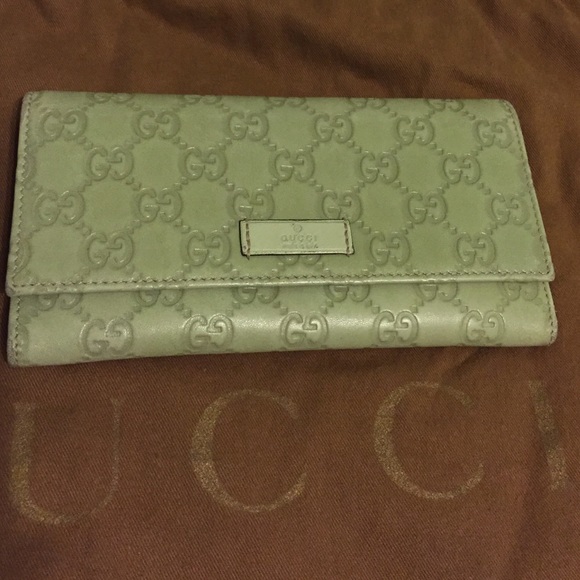 Gucci leather monogram wallet