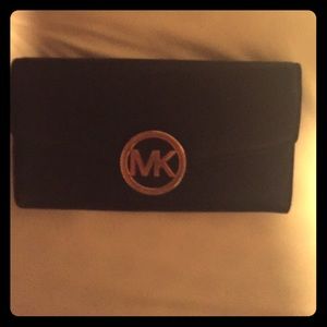 Black Michael Kors wallet mint condition.