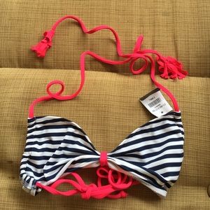 Blue and white striped bikini top with pink straps