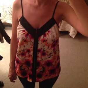 Sleeveless full front zip blouse